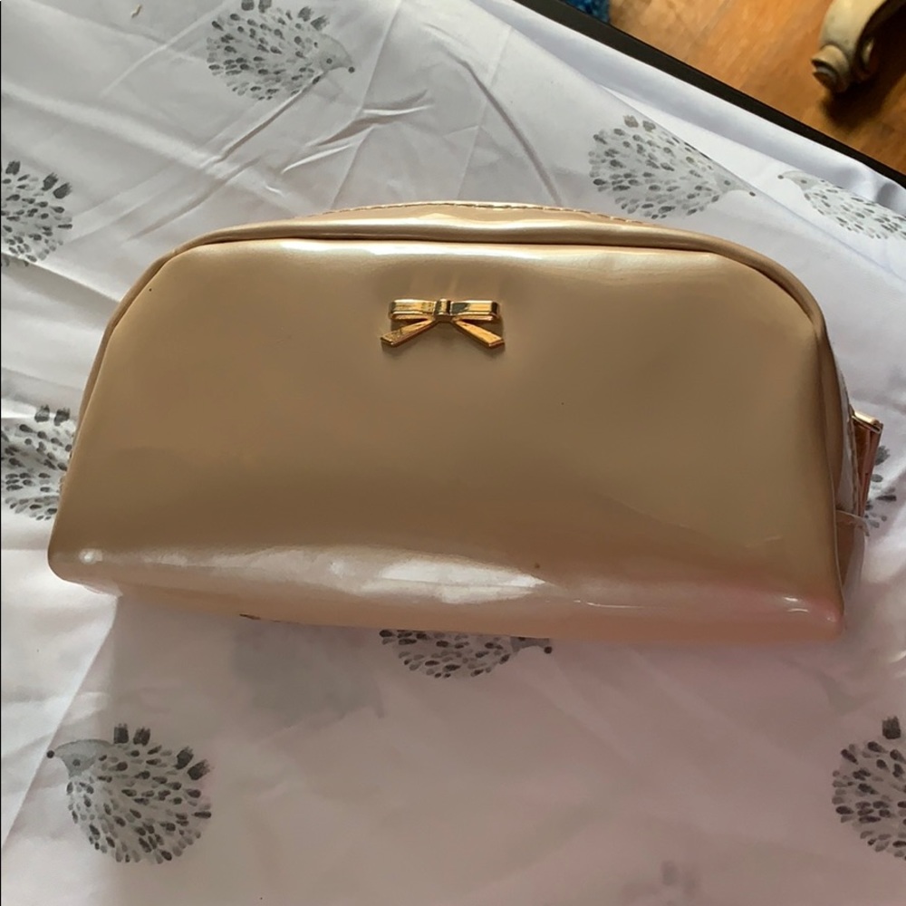 Primark Small zipper Makeup bag with gold bow